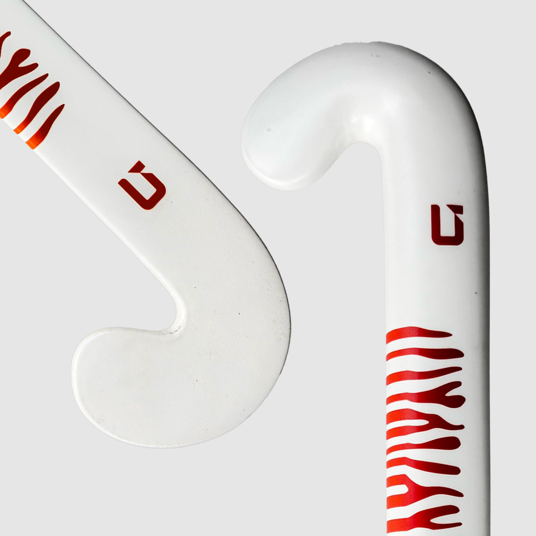 GRINT TIGRISE field hockey stick in white hot coral