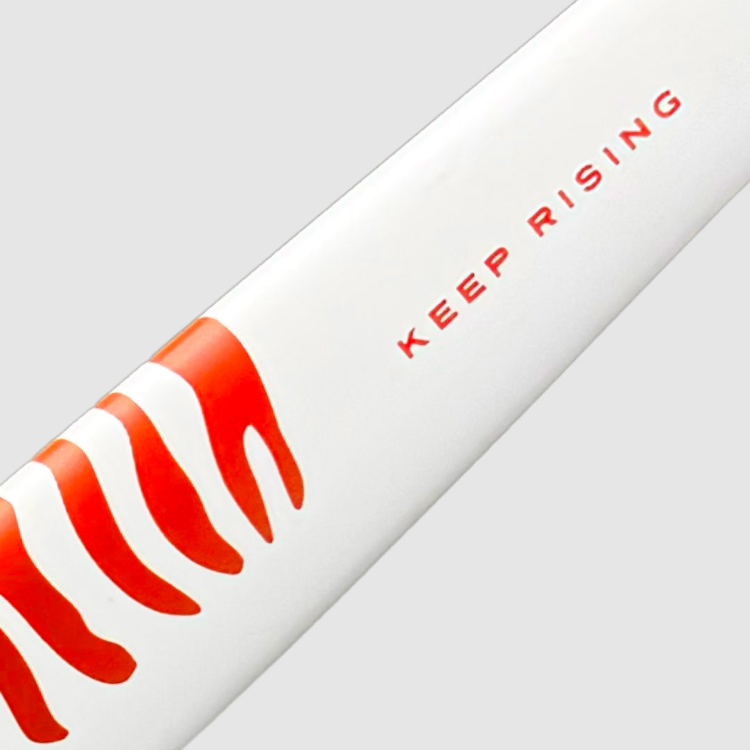 GRINT TIGRISE field hockey stick in white hot coral